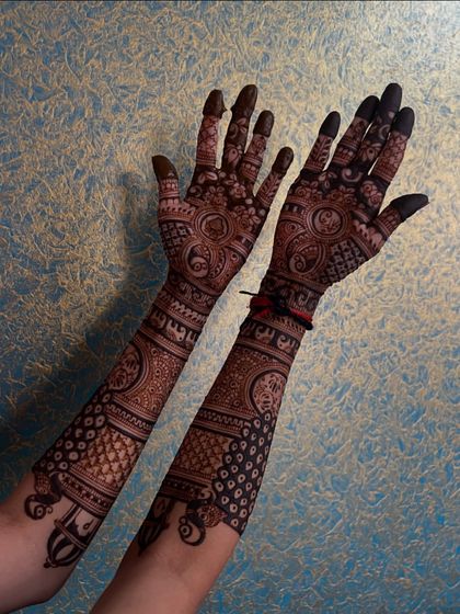 A full-arm design featuring a mix of dots and lines, creating a unique texture and look.