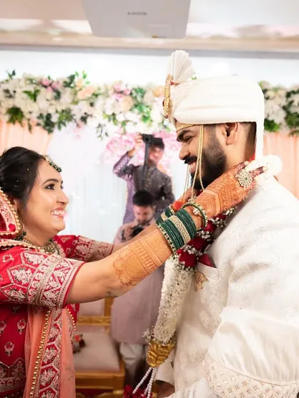 The 'varmala' exchange, a moment of mutual respect and the official start of the ceremonies.