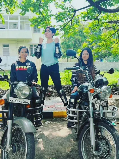 A triumphant pose from our graduates. They have conquered their fears and are now confident, capable riders.