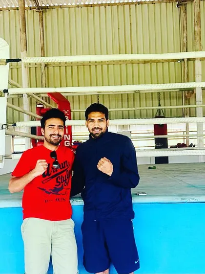 In the boxing ring with my friend, Olympian Manoj Kumar. There is mutual respect and a lot to learn between athletes from different sports.