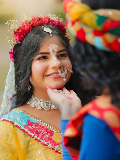 An intimate close-up showcasing the tender expression between Radha and Krishna.