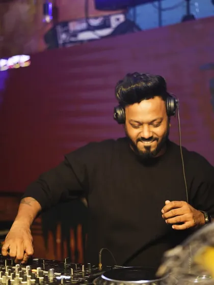 Lost in the rhythm of music. A candid moment from a Mumbai nightlife gig.