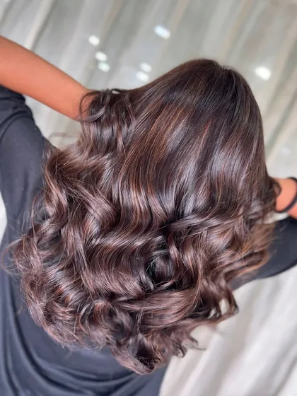 Another shot of this beautiful chocolate brown hair. The voluminous waves show off the shine and depth of the colour.