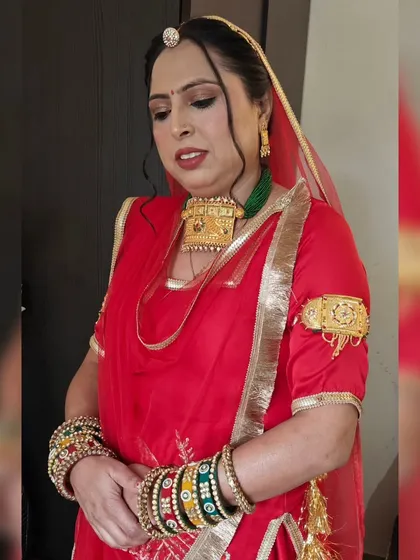 A closer look at the makeup for this Rajasthani style transformation. I used a classic red lip and soft eyeshadow to complement the client's features and her stunning traditional jewelry.