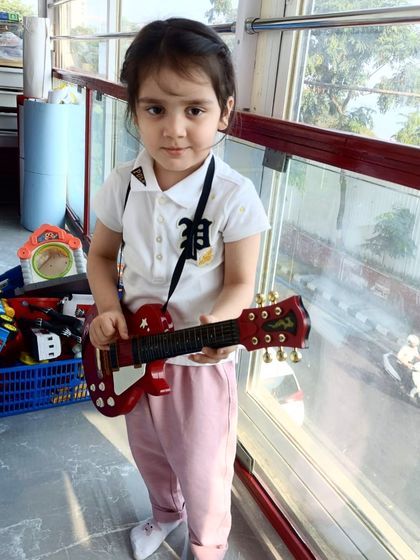 Our little rockstars exploring performance and character through music and play.