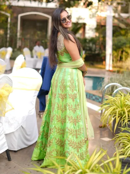 A stylish over-the-shoulder pose during the Haldi event.