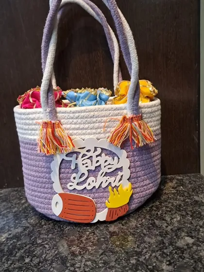 Another angle of the Lohri jute hamper, showing its sturdy rope handles.