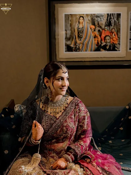 A happy and relaxed portrait of the bride, her genuine smile lighting up the frame.