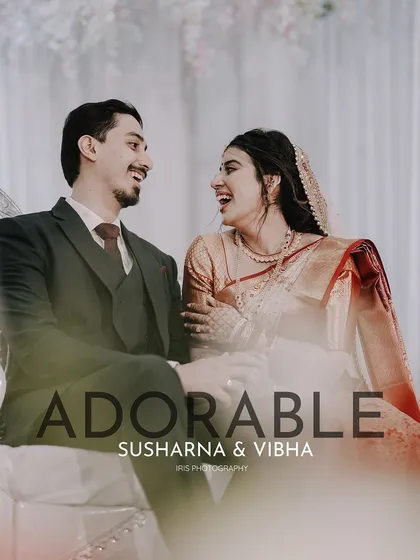 Laughter and love. This candid shot of the couple sharing a joke during their reception is full of life and genuine connection.