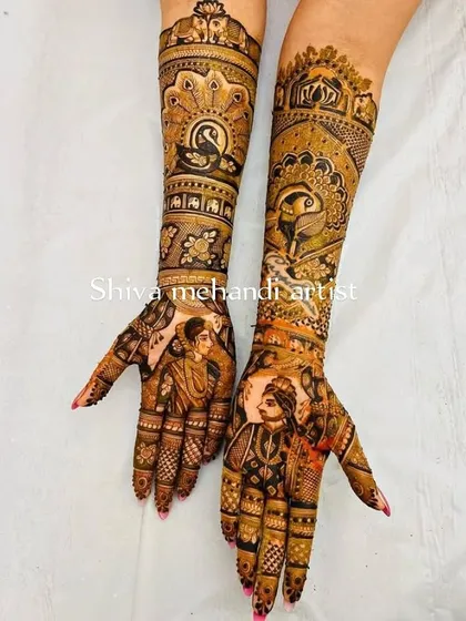 A striking portrait mehendi with the groom on one palm and the bride on the other. The design uses bold lines and shading to create a powerful and artistic look.