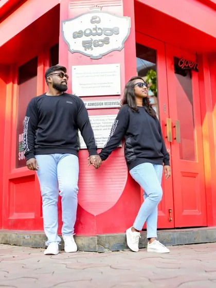 A stylish shot at the corner of a vibrant red building, capturing a cool, urban feel.