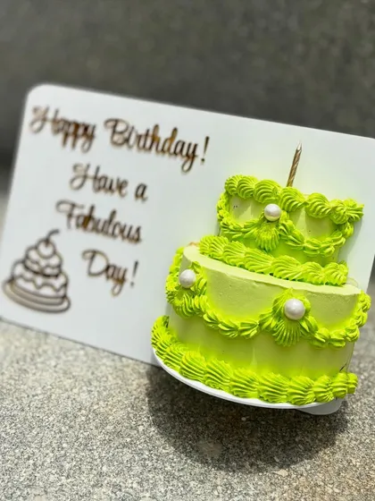 This gravity-defying photo frame cake was a tricky but rewarding challenge. It's a fully edible, 500-gram cake that looks like a picture frame, complete with a stand on the back for display before you eat it.