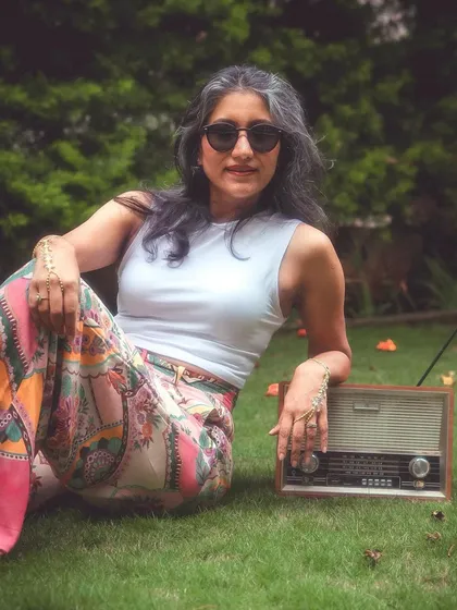 Another shot from the 70s-inspired shoot, complete with a vintage radio prop.