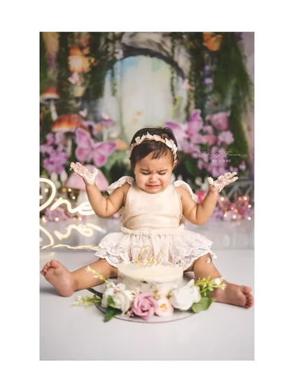 The aftermath of a fairy cake smash! Even a little meltdown can be an adorable and funny memory to look back on.