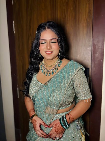 A happy, smiling shot of the client.