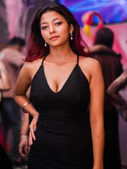 A candid shot of a guest enjoying the music at Happy Brew. My focus is on creating a vibe where everyone feels free to let loose and have a great time.