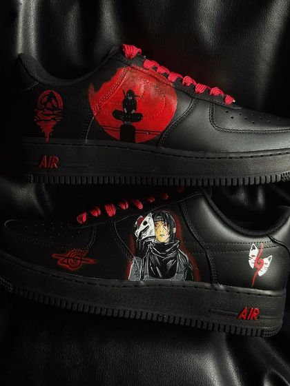 The full pair of black Itachi custom sneakers, showcasing the different designs on each shoe.