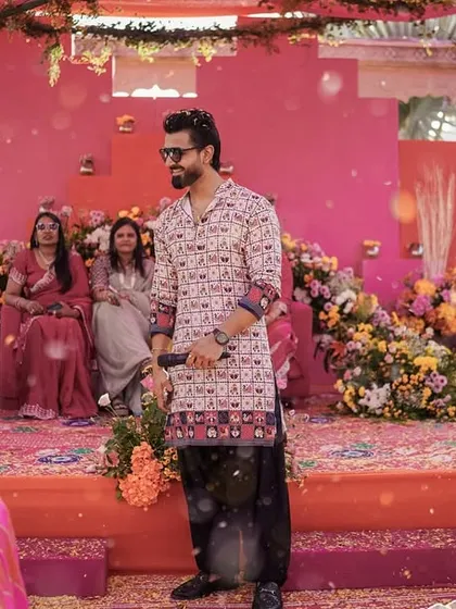 Aiming for the perfect couple shot but ending up in the middle of the Haldi chaos. As your host, I'm right there with you, enjoying every messy, beautiful moment.