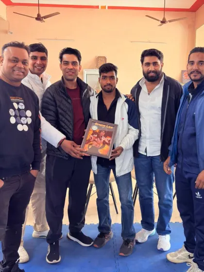 With fellow coaches and martial artists during a seminar. We were honored to present a token of appreciation to a guest.