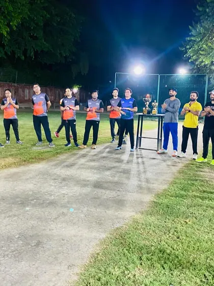 Both teams line up for the post-match presentation ceremony. We emphasize respect and sportsmanship, celebrating the efforts of all participants.