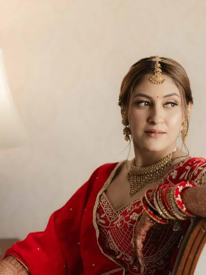 A close-up of this beautiful Marwari bride. The makeup is minimal yet provides full coverage, creating a flawless canvas that enhances her natural features.