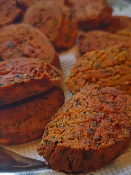 Kothimbir Wadi, or coriander fritters. My secret is a 70:30 ratio of coriander to besan, so the herb is the real star. It's a recipe straight from my mother's kitchen.