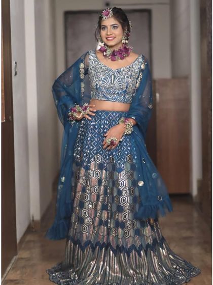 This client looks confident and happy in her distinctive teal and silver rental lehenga. My goal is to help you find an outfit that makes you feel amazing.