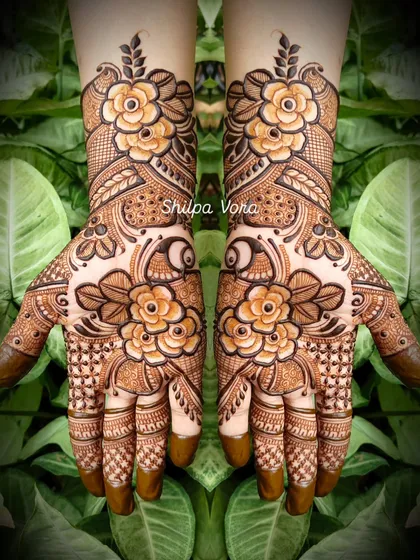 A classic floral design with large, beautifully shaded flowers, set against a natural green background.