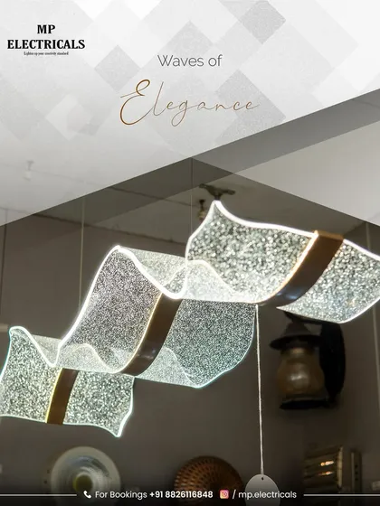 We call this one 'Waves of Elegance'. It's more than a light; it's a flowing sculpture for your ceiling. We specialize in finding and installing these unique statement pieces that become the talk of the room.