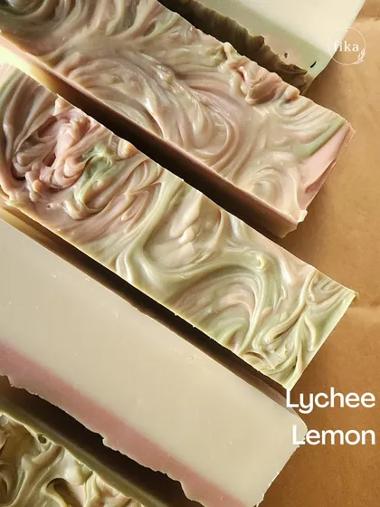 A close-up of the beautiful swirls in my Lychee Lemon soap. The colors and patterns are created by hand, showcasing the artistry that goes into every bar. It's beauty that's more than skin deep.