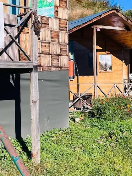 The rustic and charming wooden cottages where we stayed in Auli. Being close to nature is an essential part of the retreat experience.