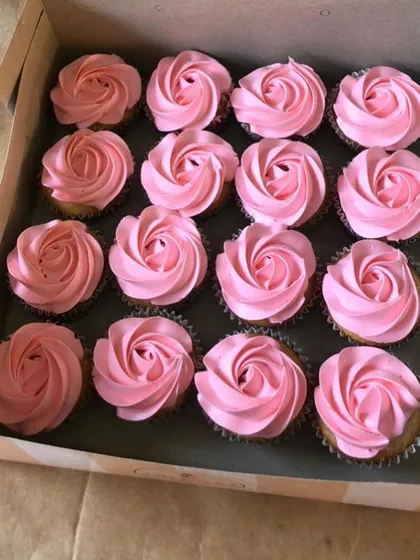 Pretty in pink. These cupcakes with delicate pink rose frosting are a beautiful addition to a baby girl's shower, a bridal shower, or a princess-themed party.