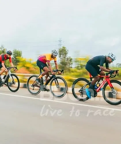 Three riders in a breakaway, pushing the limits on the open road. The dynamics of a small group escape are always exciting to watch.