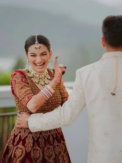 Another joyful moment. The soft touches of warmth and glow in her makeup complement her happy energy, creating a look that is both intentional and effortless.