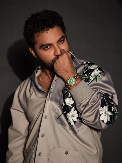 A close-up of Vishwak Sen in the Ethereal Suit, highlighting the comfortable fabric and meticulously hand-stitched buttonholes.