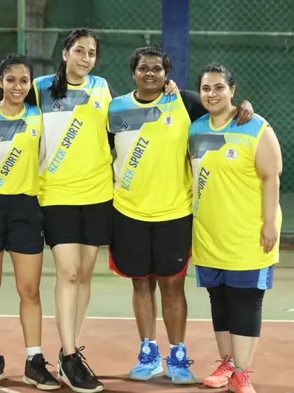 Four players from the women's division posing for a photo. The camaraderie is what makes our tournaments special.