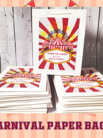 These carnival-themed paper bags are perfect for a circus or fair-themed party, featuring a classic red and white striped big top design.