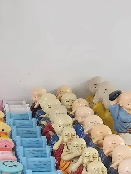 These adorable miniature monk figurines are a popular choice for adding a sense of peace and tranquility to a desk garden or bonsai arrangement.