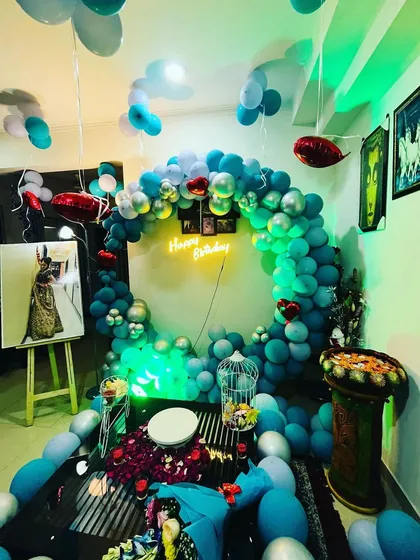The same room decoration, showing how the green light adds a different mood to the setup. I can adjust the lighting to create the perfect party vibe.