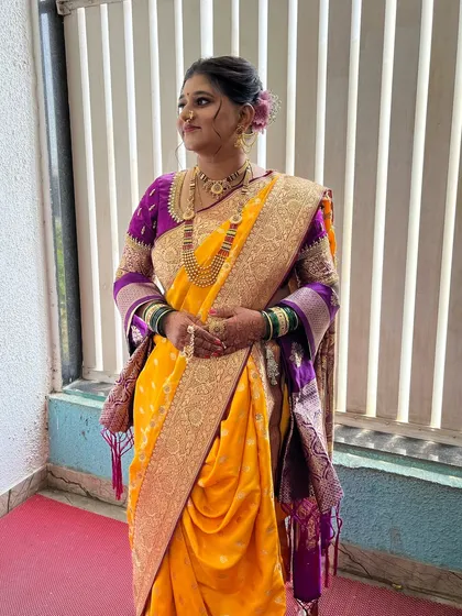 The bridal glow is real. Here, Saloni looks stunning against the natural light, showcasing the flawless, unedited makeup.