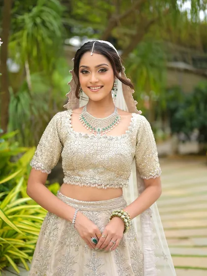 The smile of a happy bride. This look is a testament to how soft, minimal makeup can make a huge impact, creating a fresh and timeless bridal style.