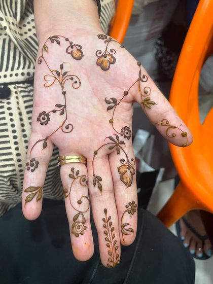 A very simple and pretty design with scattered floral motifs.