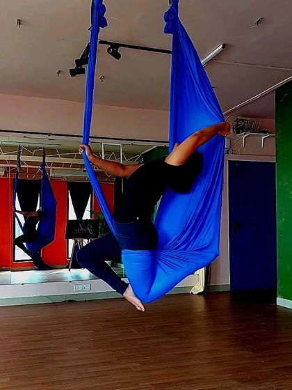 All you need to do is decide you're going to have a good day. This beautiful pose showcases both flexibility and strength, held with grace.