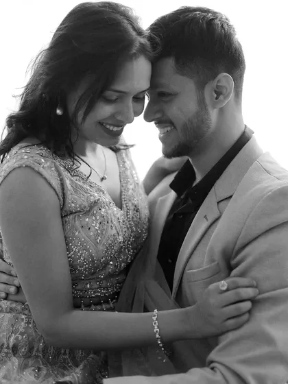A candid, black and white portrait from a couple's shoot. I aim to capture genuine connection and emotion in these sessions.