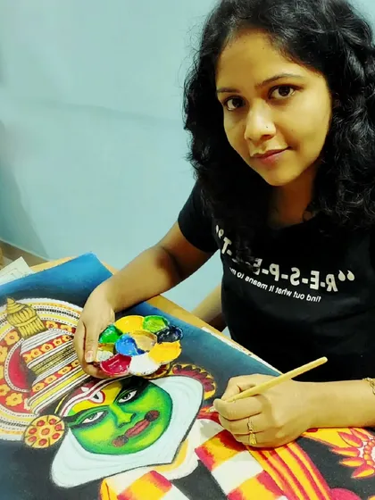 Me at my workspace, adding the final touches. The elaborate costumes of Kathakali are truly the most recognized icon for Kerala.