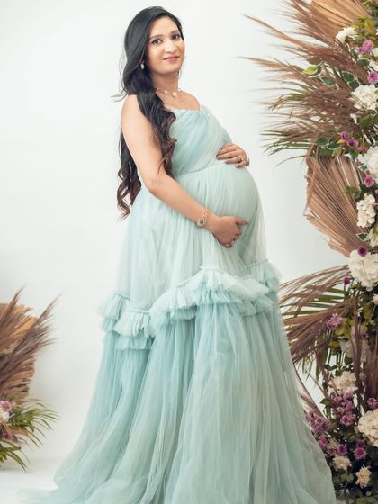 A full-length view of our Eva gown. The delicate, layered tulle and strapless design are perfect for a fairytale-themed shoot.