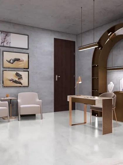 Our jewelry studio project in Gurugram is designed with a minimalist aesthetic to let the jewelry shine. The space features arched display units and comfortable seating for a personalized shopping experience.