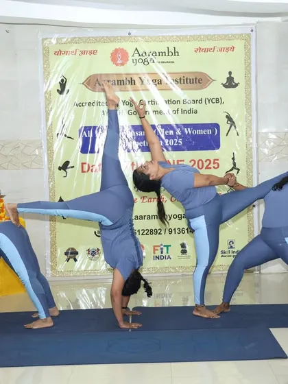 This image captures the spirit of unity and advanced practice that we cultivate in our students. Here, our trainees demonstrate a complex group yogasana formation, showcasing the strength, trust, and coordination they develop through our comprehensive teacher training program.