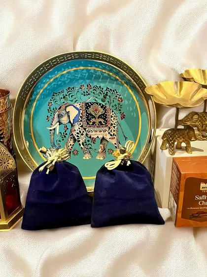 A beautifully arranged hamper showcasing traditional Indian craftsmanship, perfect for high-end corporate gifting during festivals like Diwali.