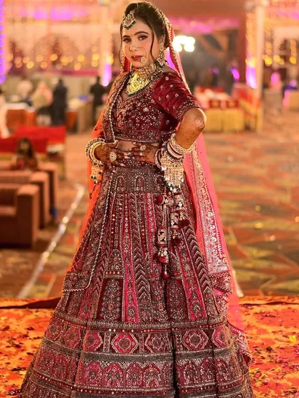 My bride Anita, looking fierce and beautiful in her maroon lehenga. I love her confident pose.